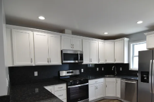 Modern white kitchen cabinet remodel in Loganton, PA