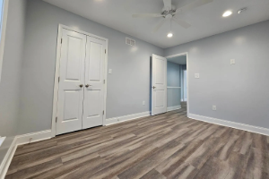 A bedroom remodel featuring luxury vinyl plank flooring in Loganton, PA